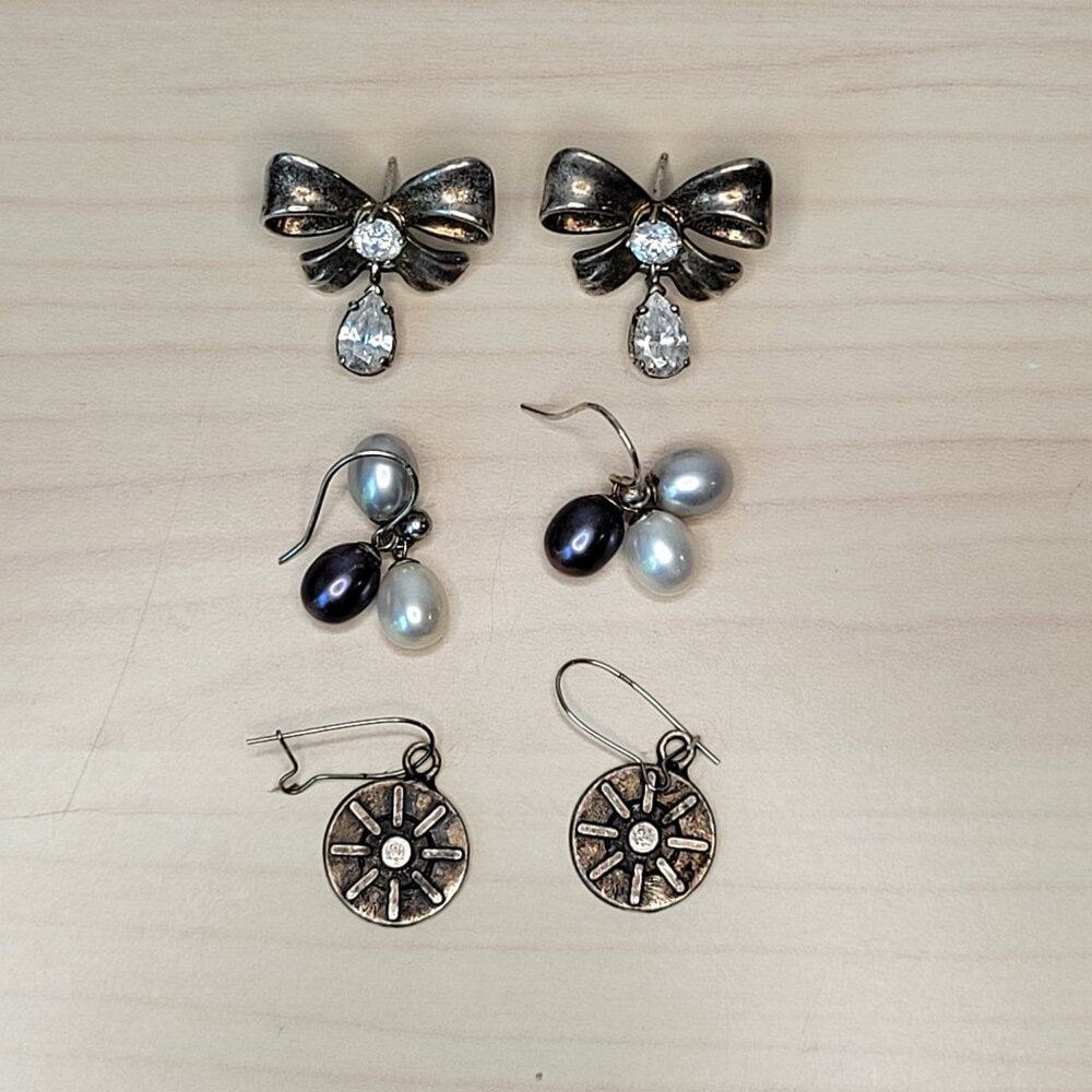 Bundle of 3 Pairs of Dangling Earrings: Silver Bows, Pearl Beads, Sun Wheel EUC